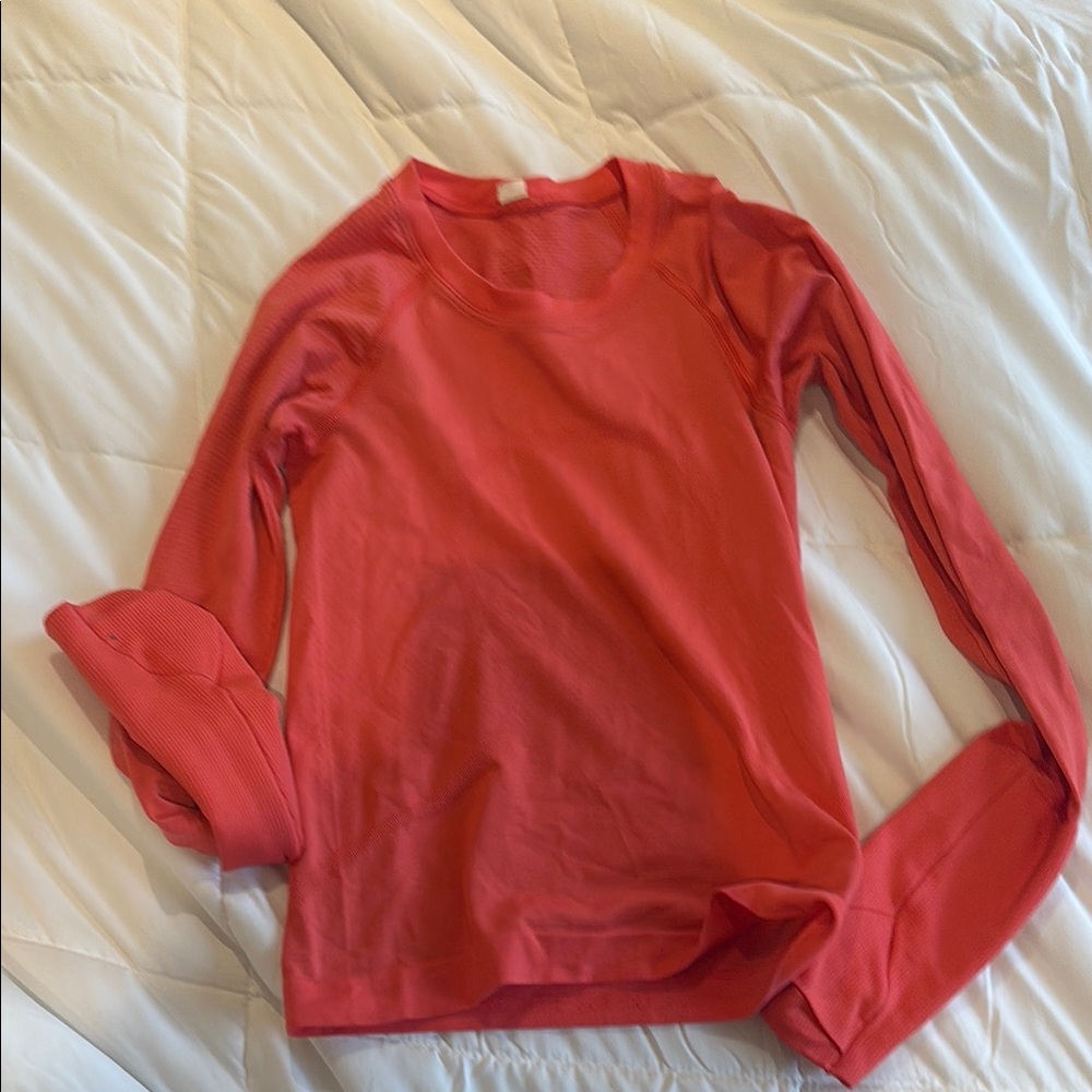 Swiftly Tech Long-Sleeve Shirt 2.0
Waist Length